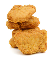 Macro of fried chicken nuggets on white background