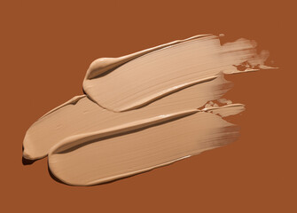 Make up foundation drop smudge texture brown isolated background