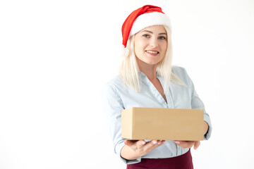 christmas, x-mas, winter, happiness concept - smiling woman in santa helper hat with parcel box