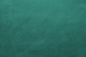 Texture of chalk on green blackboard or chalkboard background. School education board, dark wall backdrop or learning concept.