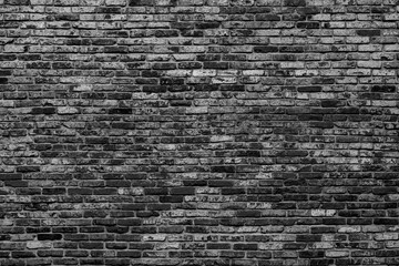 Black brick wall. Loft interior design. Architectural background.