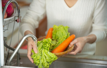 young woman with vegetables
