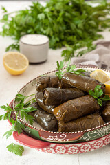 Dolma - stuffed grape leaves with rice.Traditional Caucasian,  Turkish and Greek cuisine