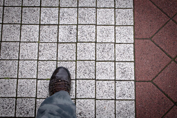 Man,s leg on the pavement, Free space
