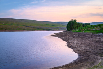 Burnhope Reservoir above Wearhead Village, which is located above the village of Wearhead in Weardale, County Durham