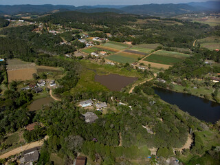 Green belt of Sao Paulo
Mogi das Cruzes, Brazil
Aerial view of vegetable crops and legumes. The region is part of the “São Paulo City Green Belt” and is basically made up of small farmers.