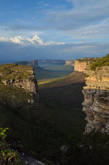 View at the top of a mountain in form of plateau with a stunning valley in front. Located at Chapada Diamantina region in Brazil.