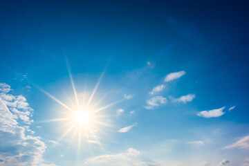 Naklejka na ściany i meble Summer background, wonderful blue sky with bright sun
