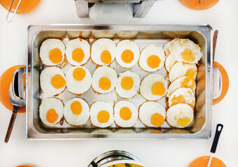 Top view, Group of Fried egg in aluminium tray