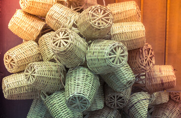 Empty wicker baskets in view in a market place