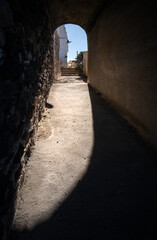 Obraz premium Streets of the white city of Santorini island under the bright sun. Greece.