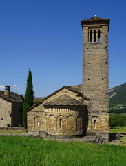 View of the bell tower and apse of the Mozarab Pre-Romanesque or Romanesque Church of San Pedro de...