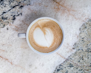 Italian cappuccino coffee cup on marble table surface