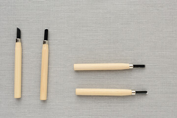 Set of different tools for cutting wood products, with a wooden handle on grey background. top view. flat lay. copy space. set carpentry tools. profession, carpentry, woodwork and people concept