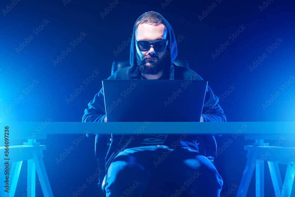 Aufkleber computer genius. computer geek with a hood works until late. computer geek in a dark room. guy with 