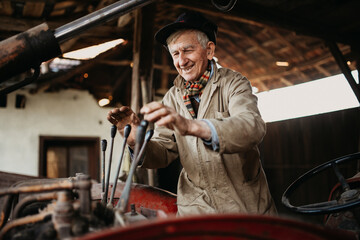Smiling senior man on his excavator