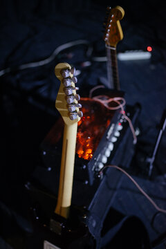 Back view of electric guitar on stage.