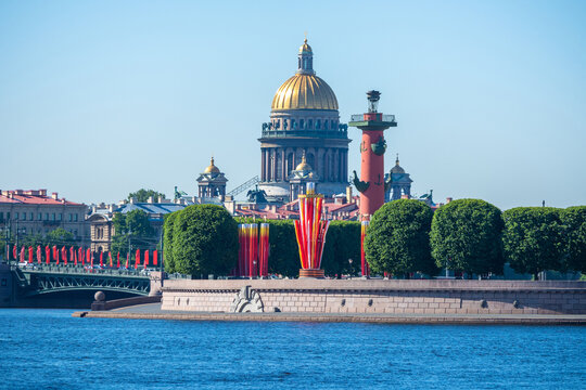 Panorama of St. Petersburg. Russia. St. Isaac's Cathedral next to Rastral Column. Panorama with the sights of St. Petersburg. St. Isaac's Cathedral view from the Neva. Panorama of the Russian city.