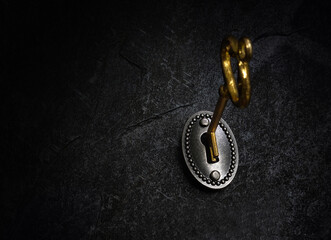 Vintage lock and gold key