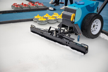 Cleaner sweeper machine on ice field