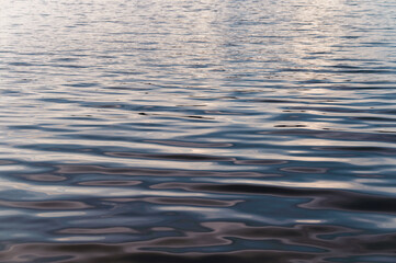 Rippled water surface on lake in evening