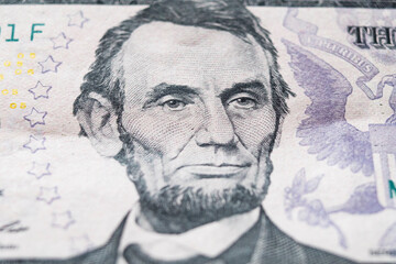 Abraham Lincoln portrait on 5 dollar bill extreme close-up