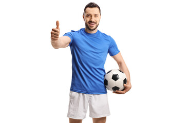 Soccer player holding a ball and giving a thumb up