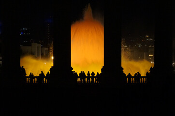 Fototapeta na wymiar Magic Fountain in Barcelona with people silhouettes in the foreground, Spain