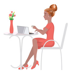 Woman working on laptop in cafe