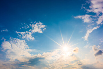 Naklejka na ściany i meble Summer background, wonderful blue sky with bright sun and clouds