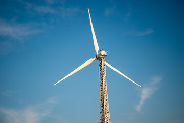 wind turbine on blue sky