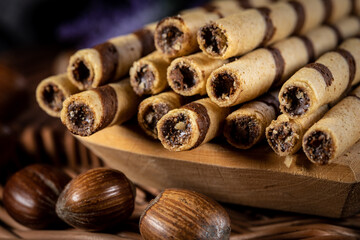 Sweet spiral tubes with nuts cream.