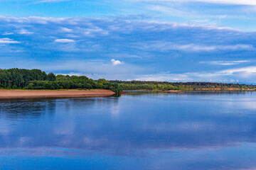 river in the countryside on a summer evening