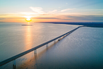Sunrise over Volga river and President bridge in Ulyanovsk, Russia aerial view