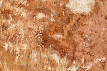Clay soil background, orange soil, closeup, texture