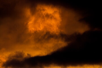 Colorful cloud patterns with golden hour light.