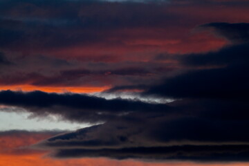 Colorful cloud patterns with golden hour light.