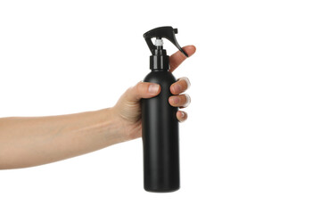 Female hand holds hairdressing spray, isolated on white background
