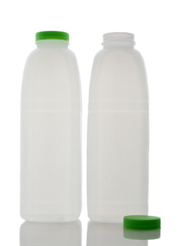White plastic milk bottles isaolated on white.