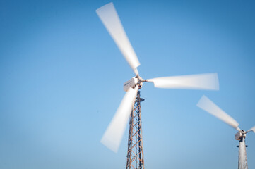 wind turbine on blue sky