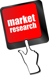 key with market research text on laptop keyboard, business concept