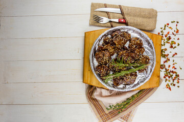 pork with sweet and sour sauce in a pan