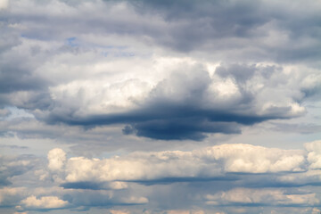 Dark grey storm clouds before rain. Dramatic natural sky background