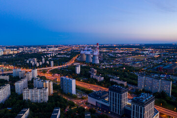 panoramic views of the city infrastructure in the evening filmed from a drone