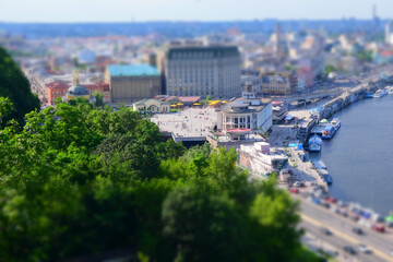 Fototapeta premium Summer panorama of the city with miniature effect 
