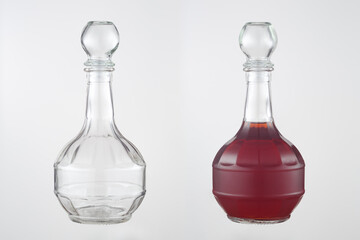 Homemade liqueur in a figured glass decanter with a glass stopper. A set of images on a gray background. Empty and full decanter.