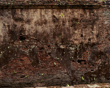 Clad Brick Wall In Hue Imperial City, Dashed With Bullet Holes From The Vietnam America War