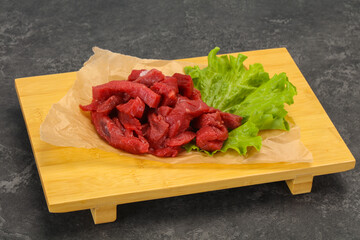 Raw beef meat sliced for cooking