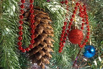 Image of Christmas decorations on the Christmas tree. New year card close up.