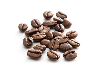 stack of roasted coffee beans isolates on white background..